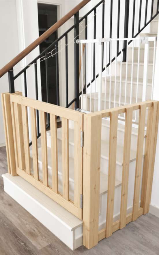 The Kensington L-Shaped Gate in natural wood fitted around a stair opening